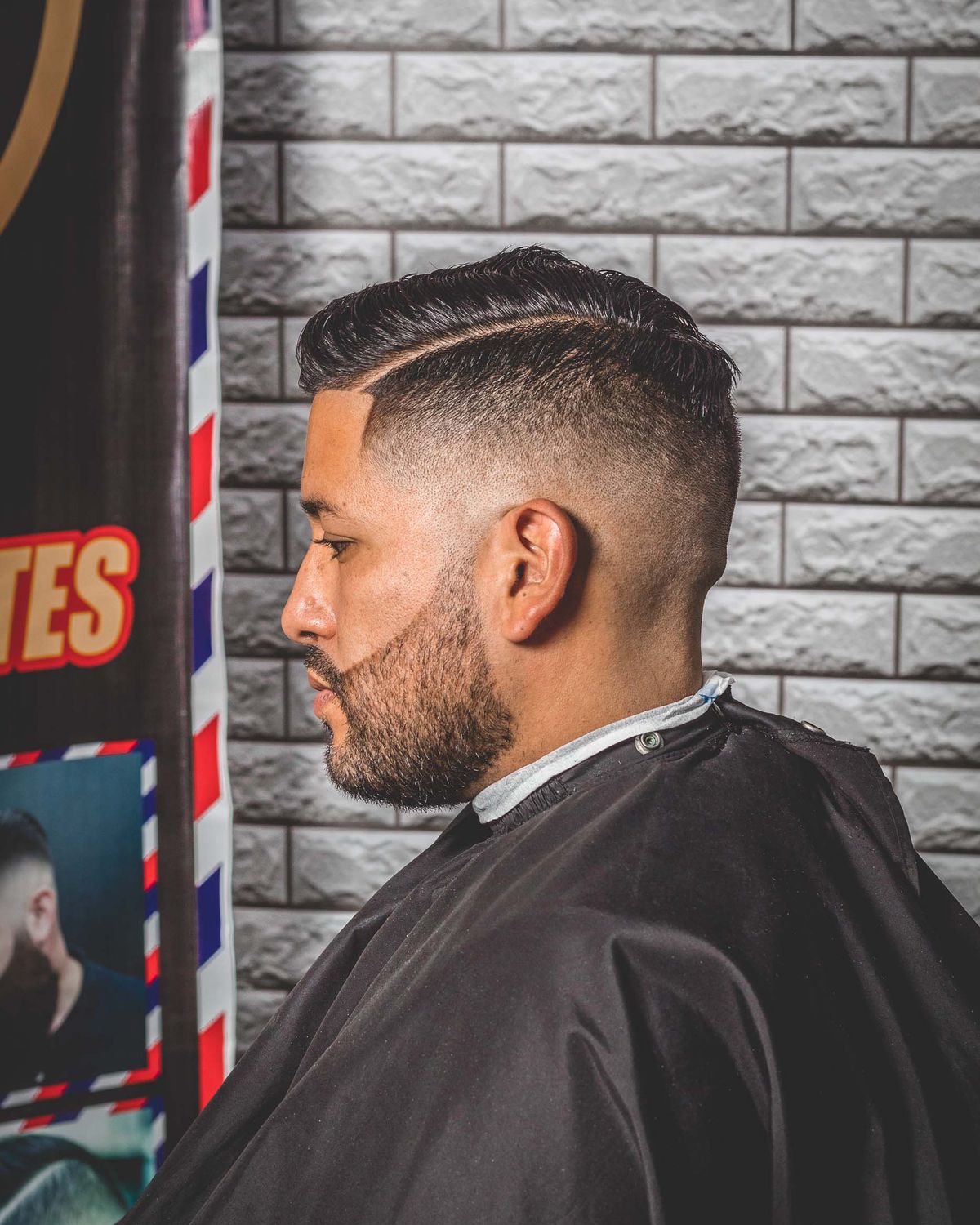 A classic tapered men’s haircut in profile