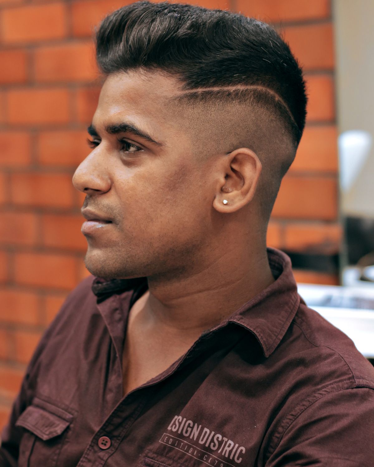A fresh skin fade seen in profile