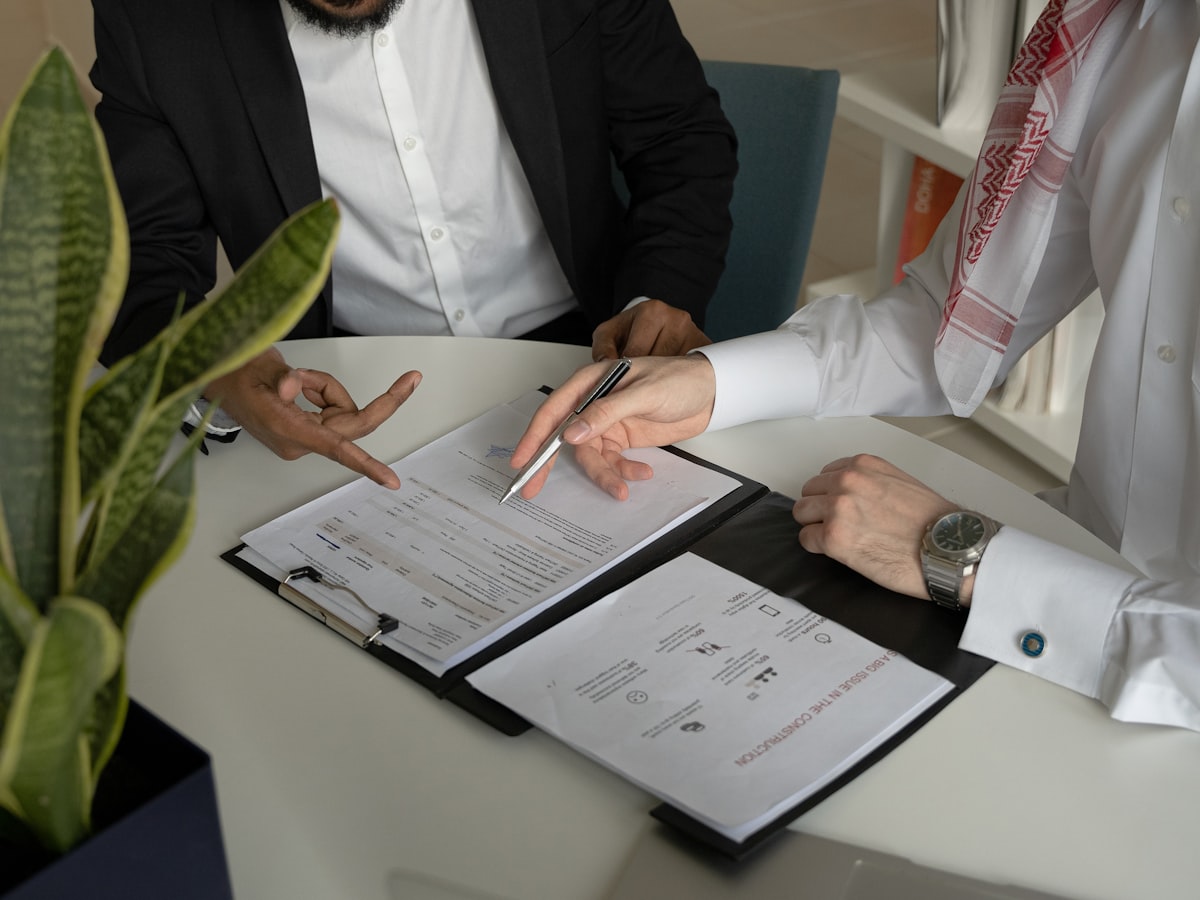 Attorneys reviewing documents and planning a matter