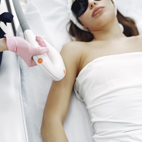 A laser hair removal treatment in progress