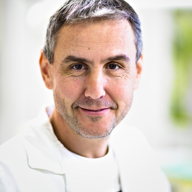 A Meridian dentist smiling