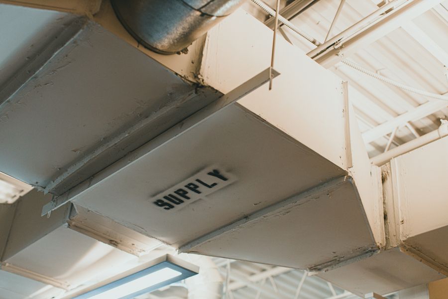 Clean supply ductwork overhead in a Utah home